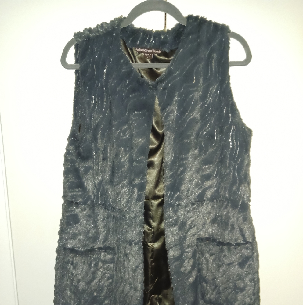 Mushkaby Sienna Rose, Inc.. Hip length faux fux vest with sequins!
